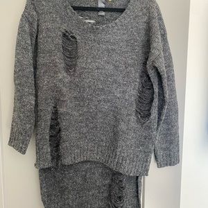 Grey distressed sweater in size large